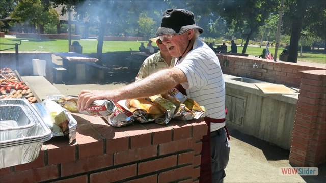 Jim Hoenshelt prepares the French bread